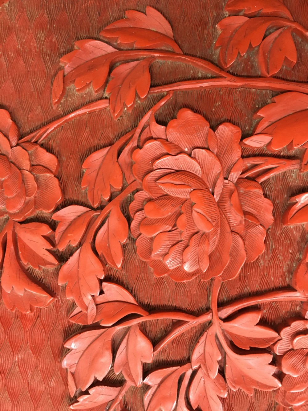 Round Cinnabar Plaque Flowerhead Form Peomy Motif c1930 View II