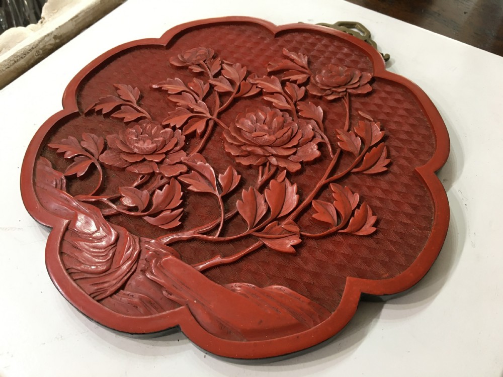 Round Cinnabar Plaque Flowerhead Form Peomy Motif c1930 View V