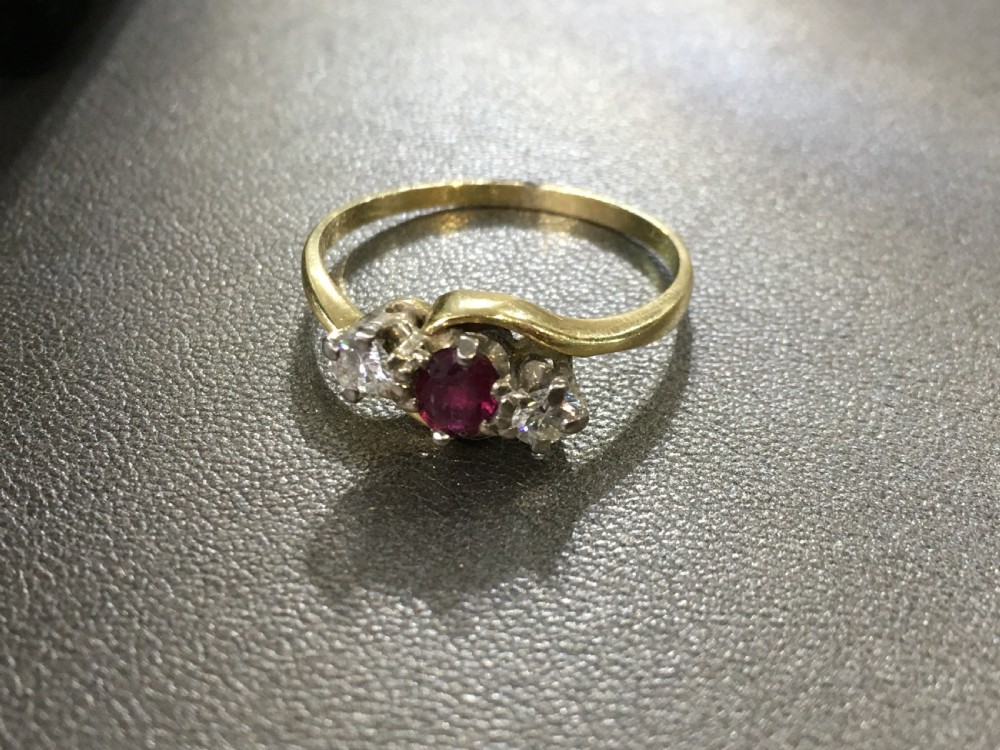 Ruby with diamond cushions, diamond Bow ring, 18ct gold, size S  View III