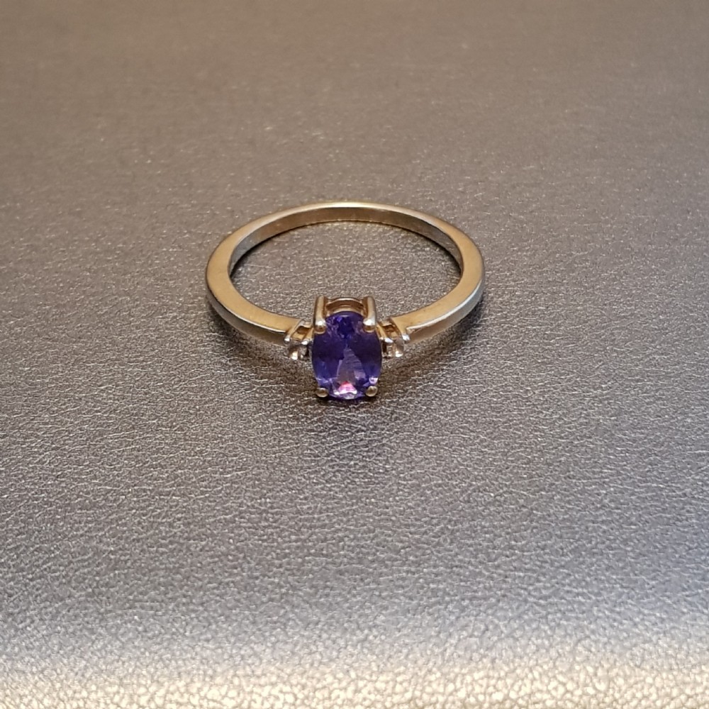 Tanzanite & Diamond Ring on 9
Ct Gold- Size P / P ½ View III
