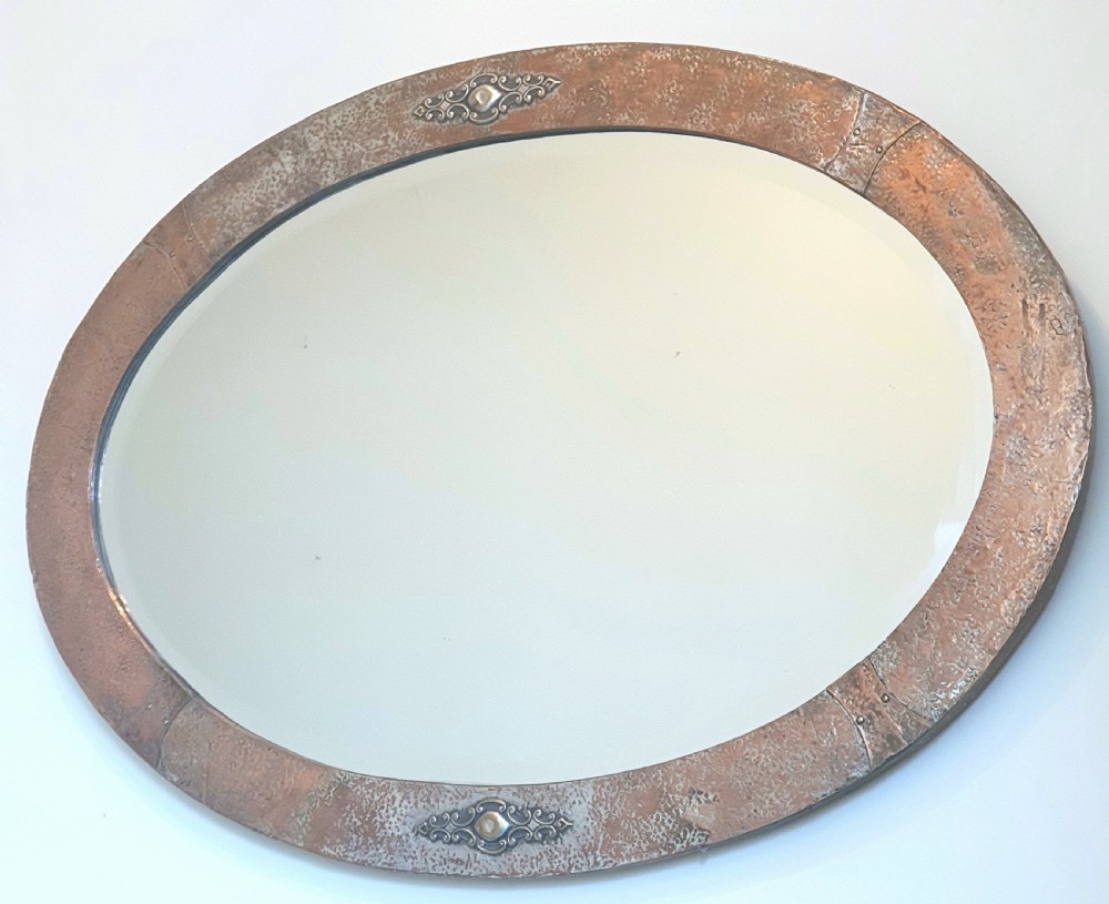 Arts & Crafts Silver over Bronze & Copper Studded Oval Wall Mirror with Original Wooden Backing