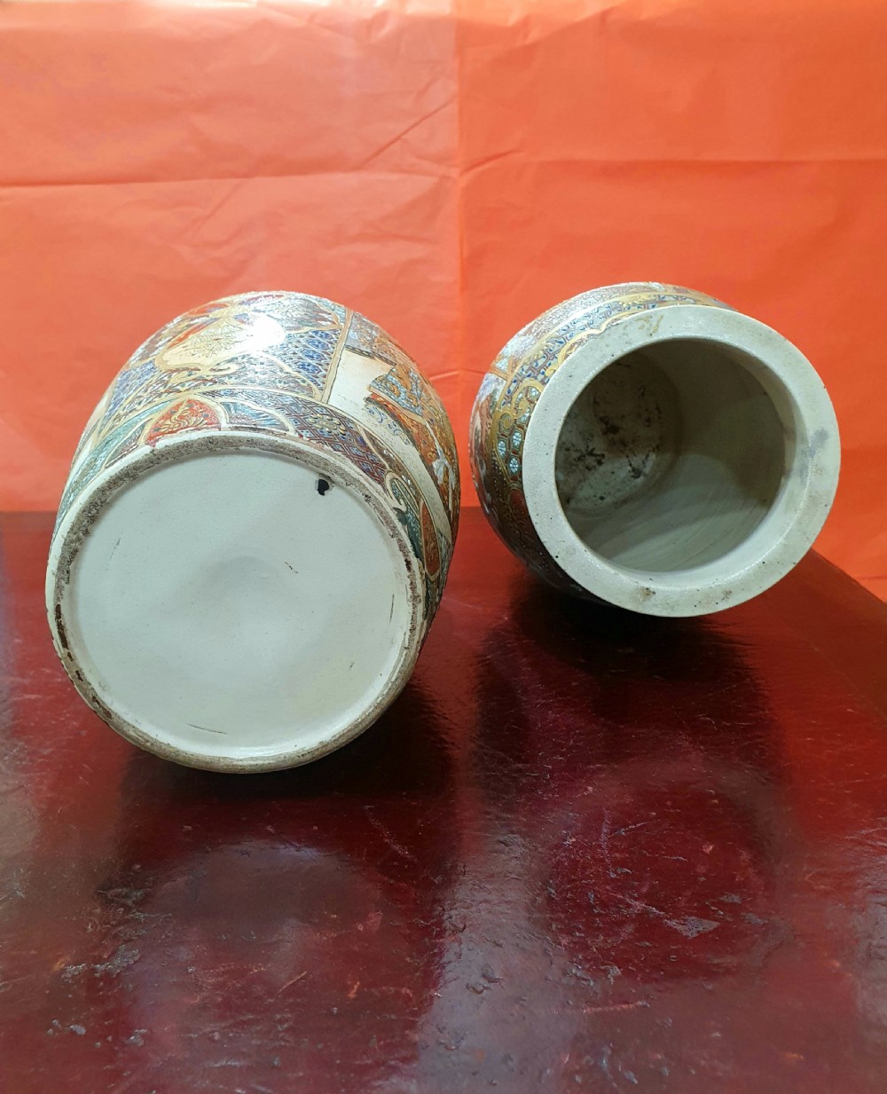 A pair of Japanese Satsuma earthenware vases decorated with detailed gilded panels and painted figures. View XIII