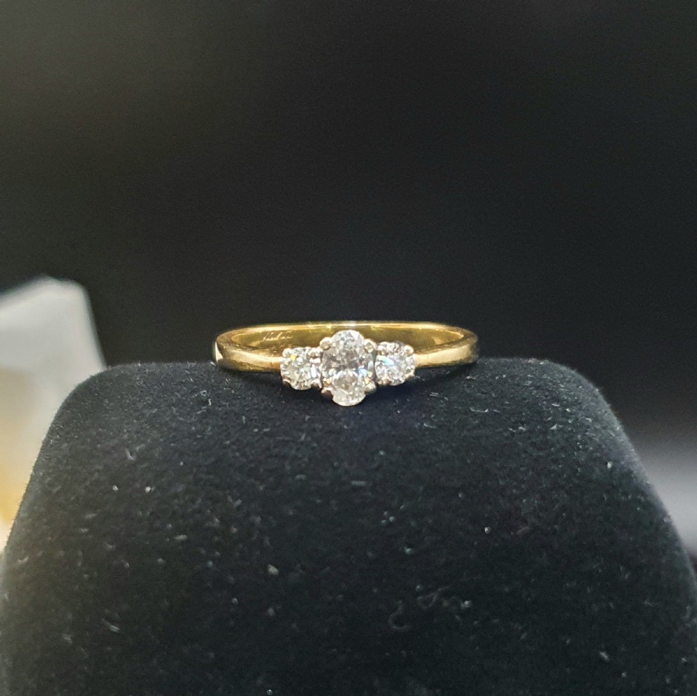 Vintage Diamond Trilogy on 18ct Gold Band - size N View V