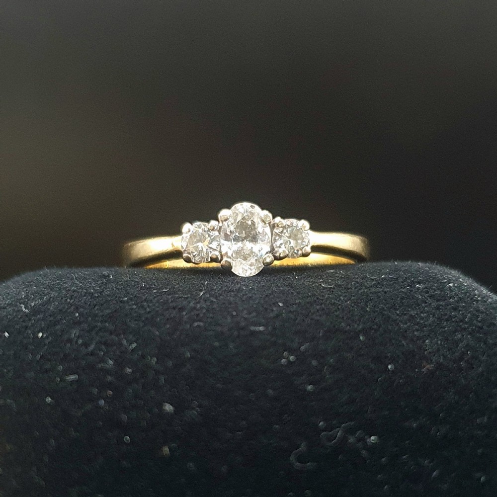 Vintage Diamond Trilogy on 18ct Gold Band - size N View VI