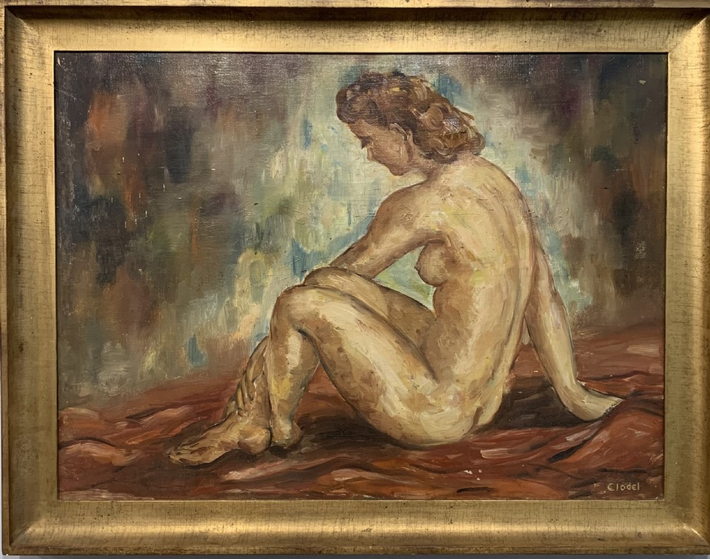 An Art Deco oil painting depicting a seated female nude in profile against a textured background, rendered in warm ochre tones and set in a gilded frame.