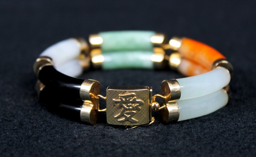 Early 20th C 14CT gold, black onyx and Jade bracelet