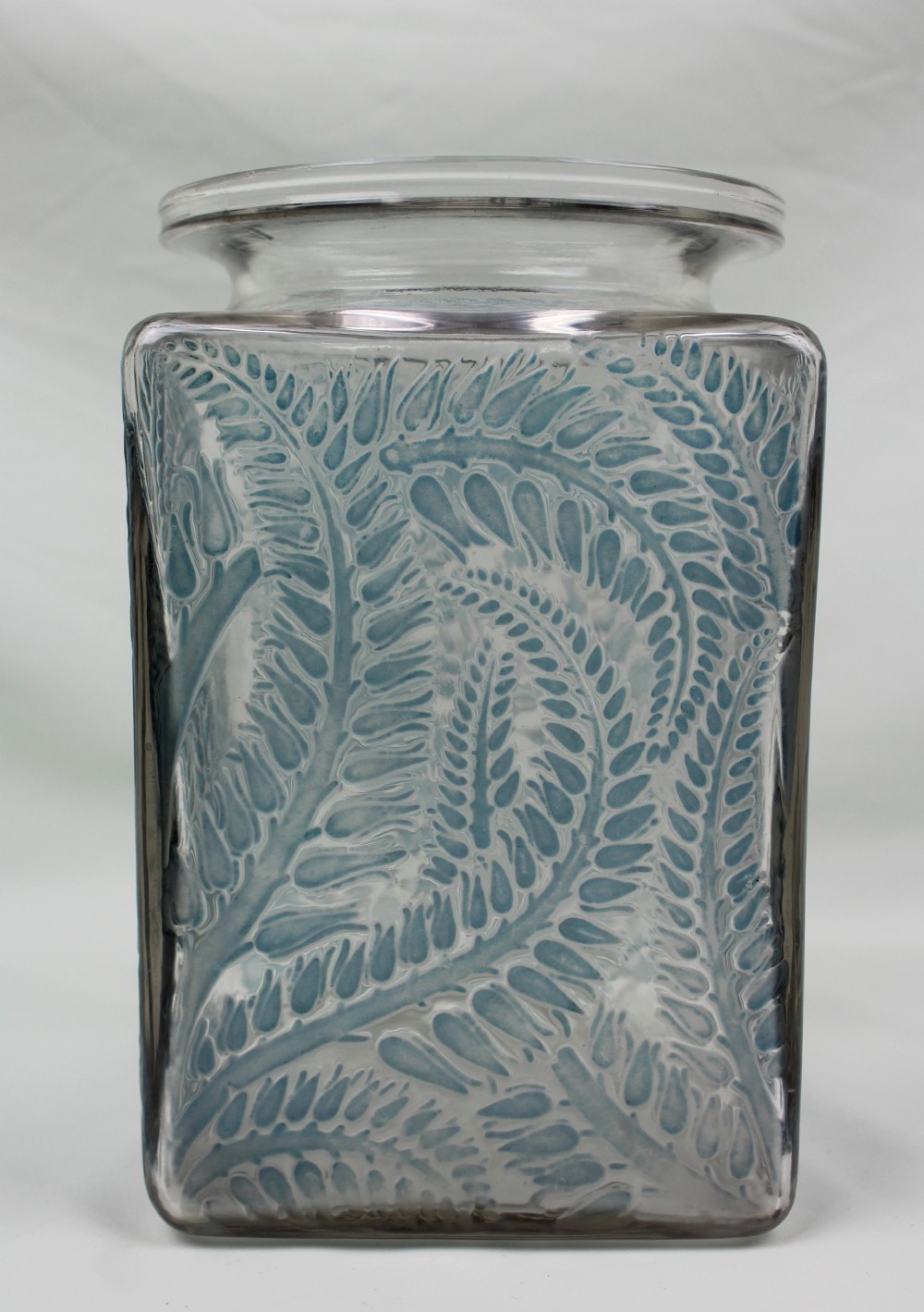 A square Rene Lalique Myrrhis clear glass vase featuring relief-moulded botanical motifs highlighted with blue staining. View II