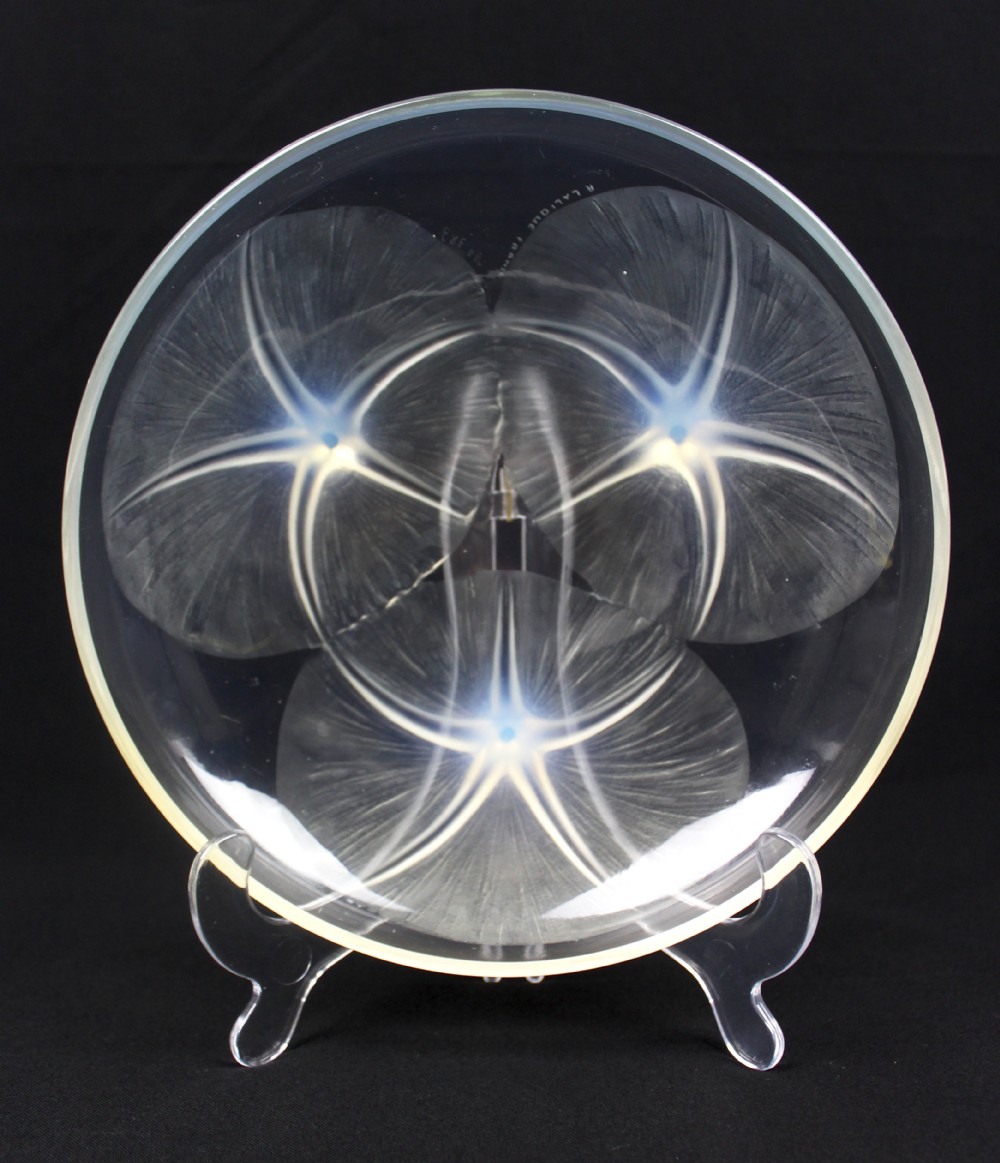 A circular Rene Lalique opalescent glass bowl featuring three relief-moulded morning glory flowers whose stems extend to form feet on the underside. View III