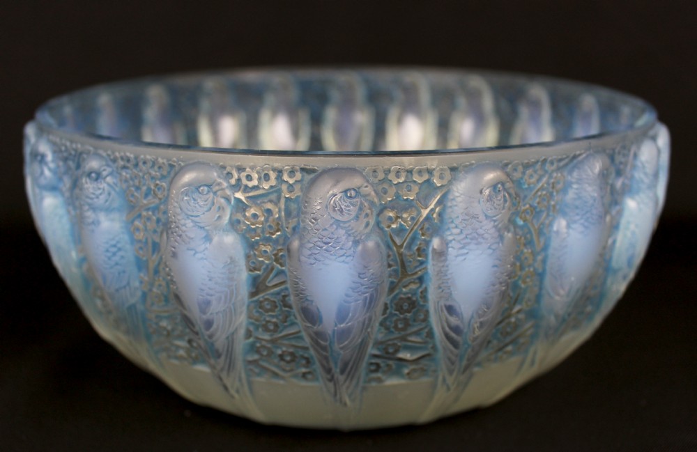 An Art Deco opalescent glass bowl decorated with a continuous molded relief pattern of parakeets perched among flowering branches. View II