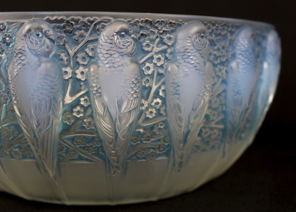 An Art Deco opalescent glass bowl decorated with a continuous molded relief pattern of parakeets perched among flowering branches. View III