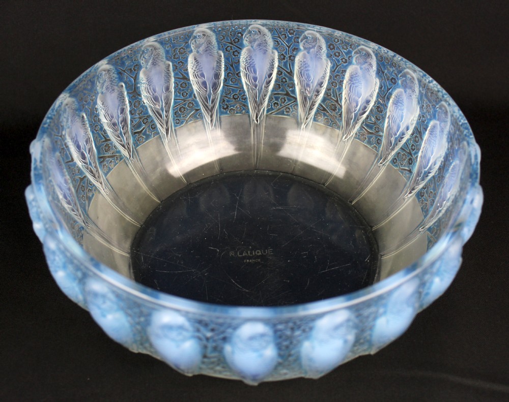 An Art Deco opalescent glass bowl decorated with a continuous molded relief pattern of parakeets perched among flowering branches. View IV