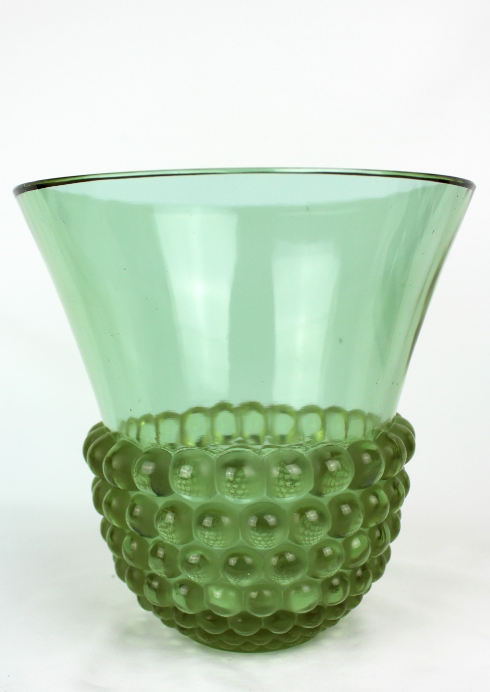 An Art Deco green glass vase featuring a smooth flared upper body and a base textured with raised spherical cabochons.