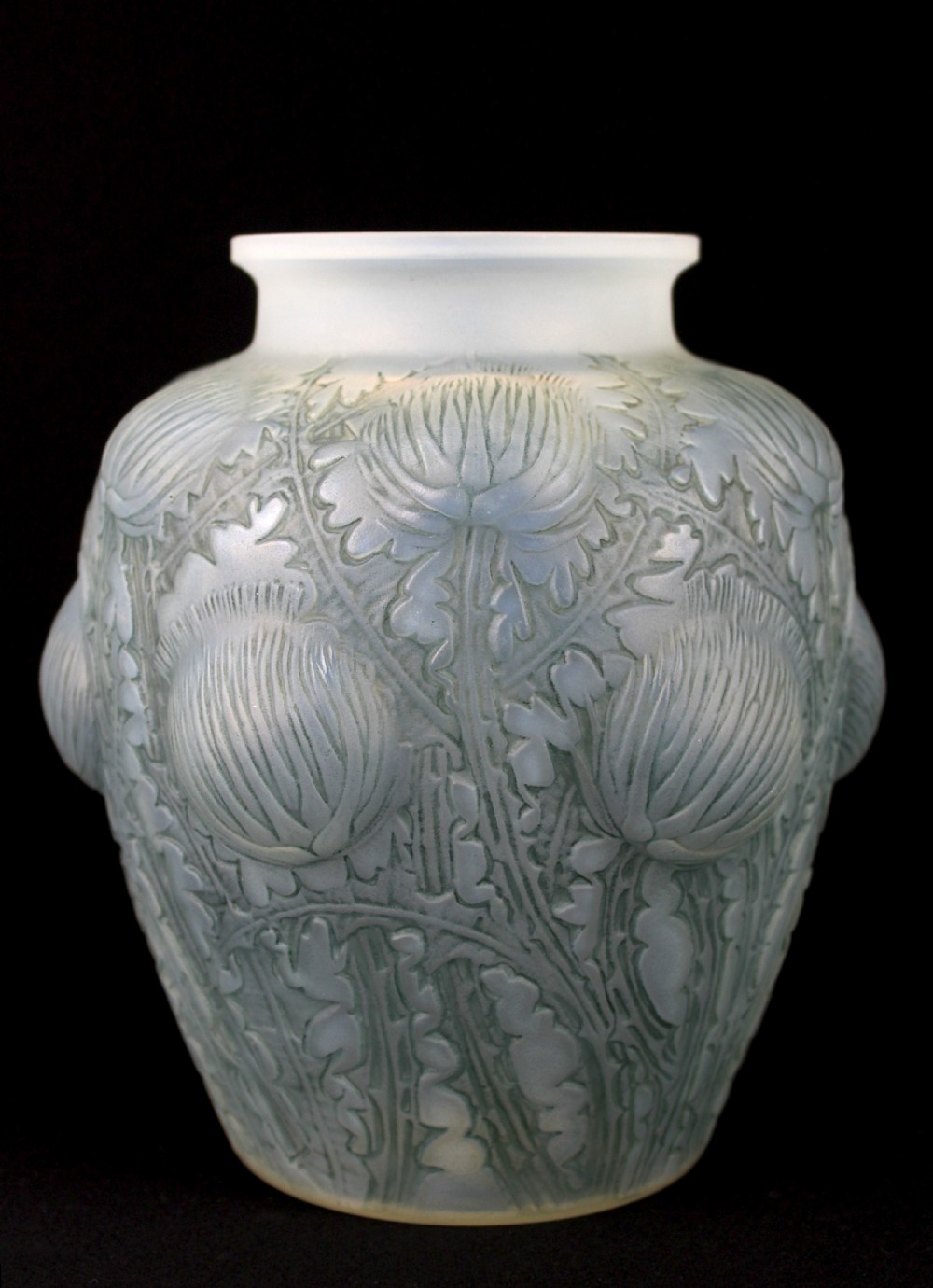 An Art Deco opalescent frosted glass vase featuring relief-moulded thistle motifs with translucent blue tones.