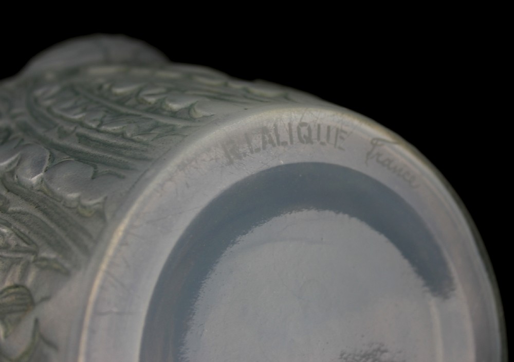 An Art Deco opalescent frosted glass vase featuring relief-moulded thistle motifs with translucent blue tones. View VI