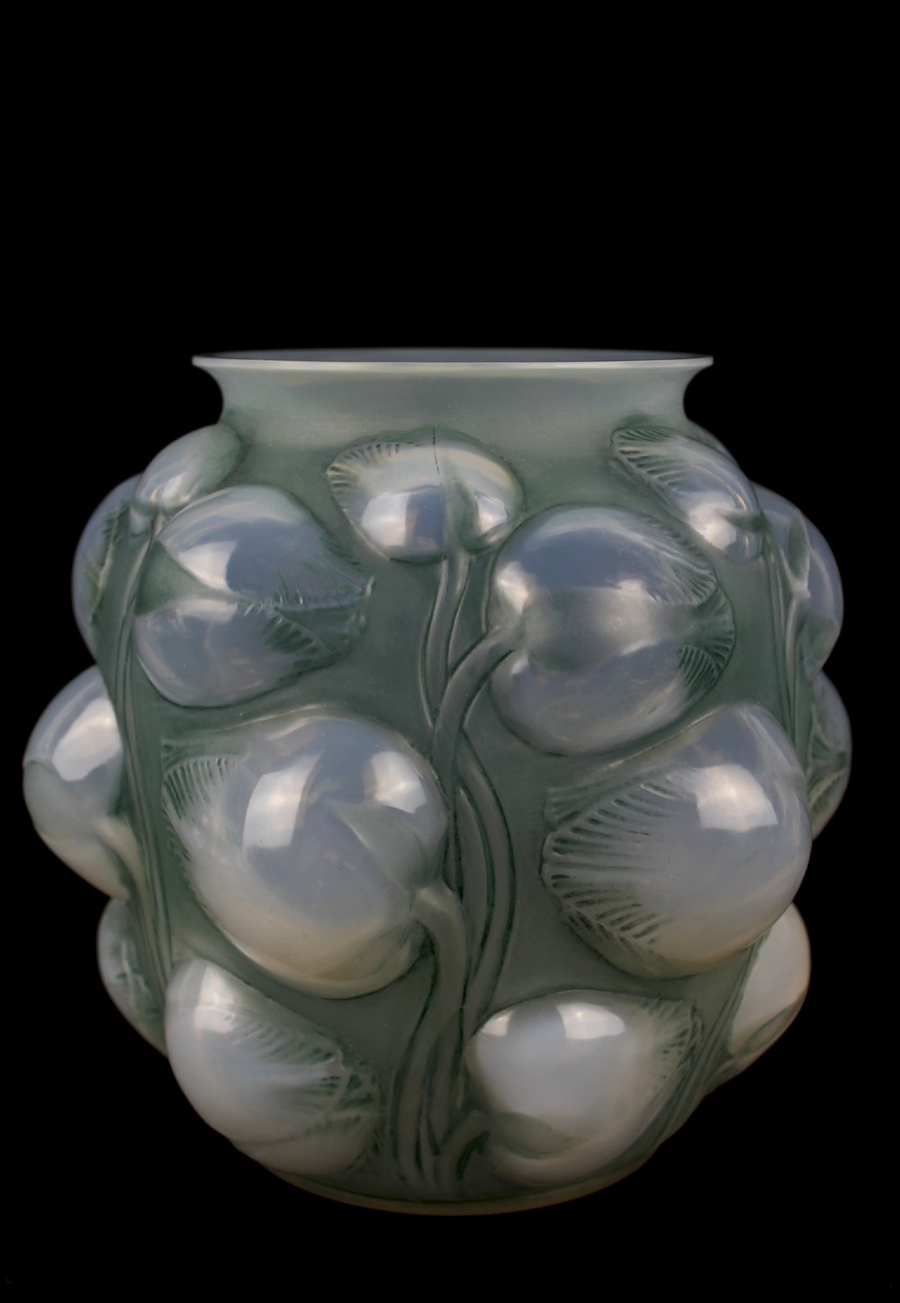 An Art Deco opalescent glass vase featuring high-relief moulded tulip buds and leaf detailing. View II