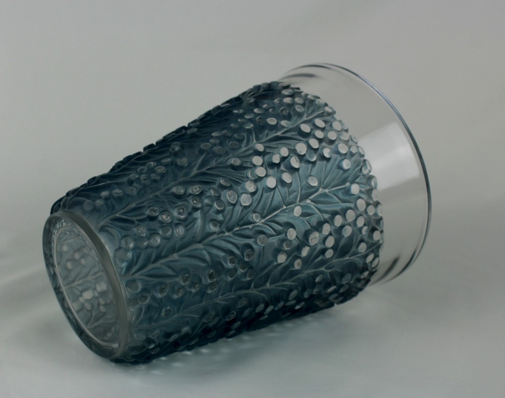 An Art Deco Rene Lalique Saint Tropez vase in clear and frosted blue-stained glass featuring a raised foliage and berry relief pattern. View IV