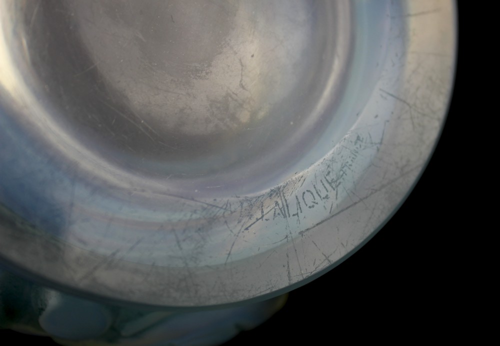An Art Deco opalescent glass vase featuring a flared clear rim atop a base moulded with finches in foliage. View II