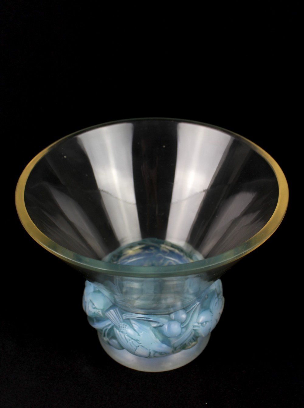 An Art Deco opalescent glass vase featuring a flared clear rim atop a base moulded with finches in foliage. View VI