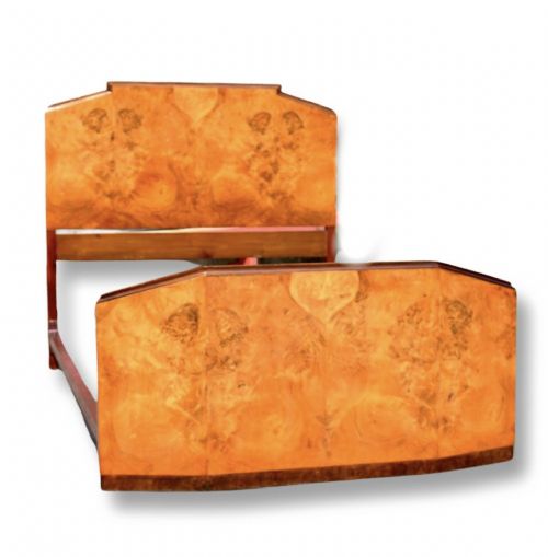fig 1. An Art Deco double bed headboard and footboard set featuring book-matched figured walnut veneer and a stepped geometric profile.