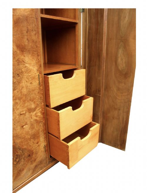 fig 1. An Art Deco triple-door wardrobe crafted in warm brown burr walnut with stepped sides and central brass handles.