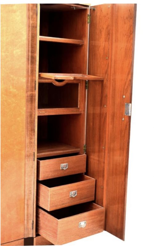 fig 1. An Art Deco triple door maple wardrobe with vertical dark wood banding and internal fitted drawers.
