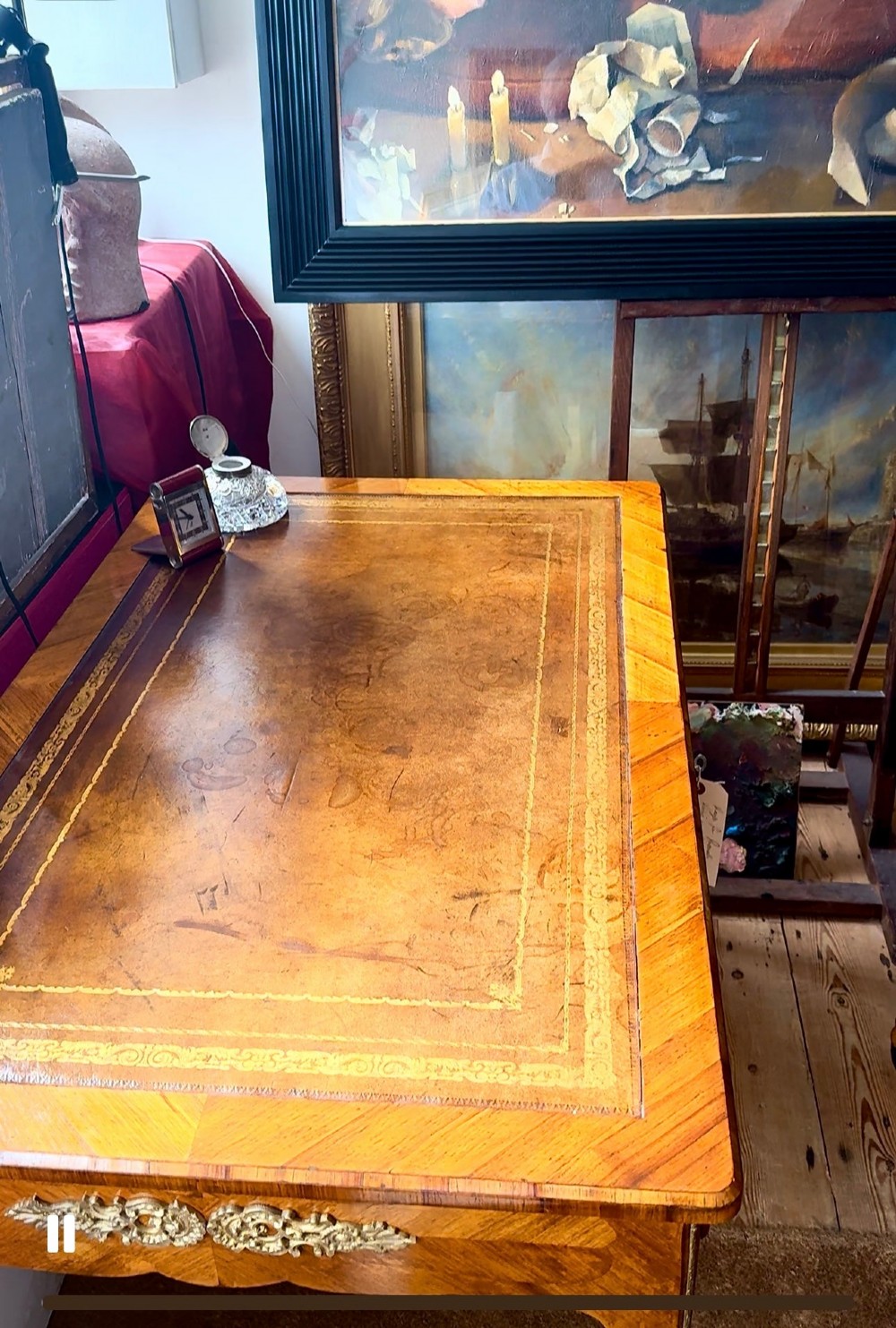 A French Louis XV style kingwood bureau desk featuring a gilt-tooled leather writing insert, parquetry veneer, drawer compartments with brass handles, and sweeping cabriole legs. View II