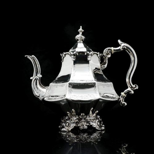 A Victorian Solid Silver Teapot with Engraved Panels - John & George Angell 1846
