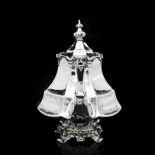 fig 2. A Victorian Solid Silver Teapot with Engraved Panels - John & George Angell 1846