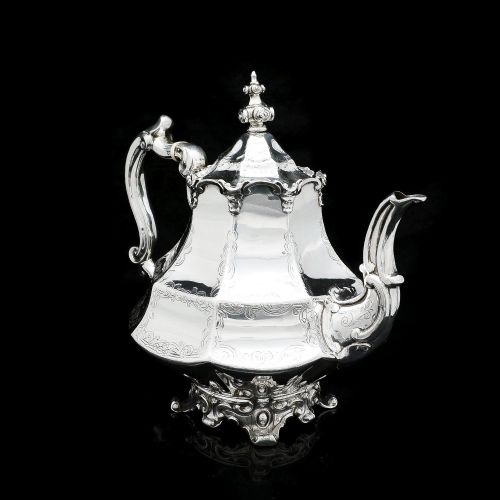 fig 4. A Victorian Solid Silver Teapot with Engraved Panels - John & George Angell 1846