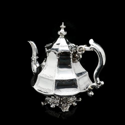 fig 6. A Victorian Solid Silver Teapot with Engraved Panels - John & George Angell 1846