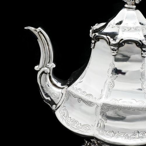 fig 7. A Victorian Solid Silver Teapot with Engraved Panels - John & George Angell 1846