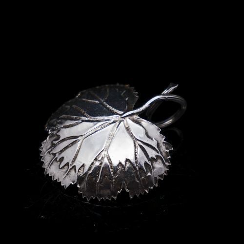 fig 2. A Georgian Solid Silver Tea Caddy Spoon in Grape Leaf Form - Taylor & Perry 1834