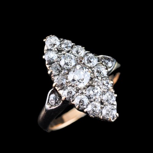 fig 3. A late Victorian yellow gold and diamond navette cluster ring featuring hand-cut diamonds set in an elongated marquise shape.