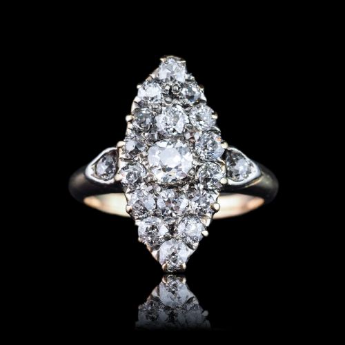 fig 4. A late Victorian yellow gold and diamond navette cluster ring featuring hand-cut diamonds set in an elongated marquise shape.