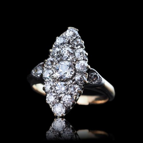 fig 5. A late Victorian yellow gold and diamond navette cluster ring featuring hand-cut diamonds set in an elongated marquise shape.