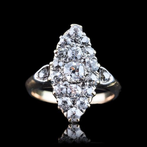 fig 7. A late Victorian yellow gold and diamond navette cluster ring featuring hand-cut diamonds set in an elongated marquise shape.