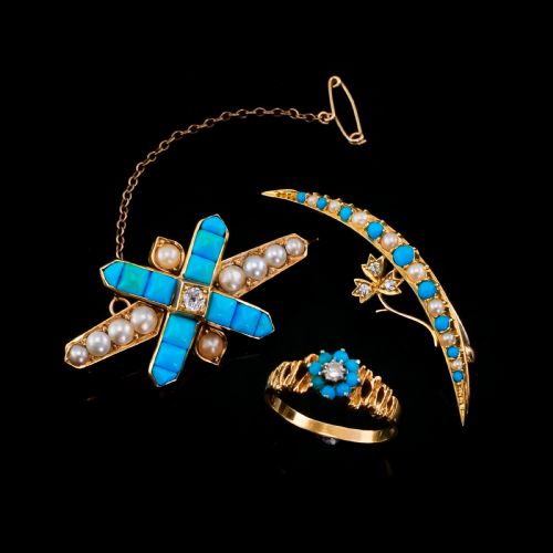 fig 1. A Victorian 15ct yellow gold crescent brooch set with alternating turquoise cabochons and split pearls, featuring an offset diamond trefoil motif.