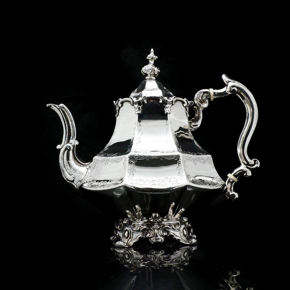 A Victorian Solid Silver Teapot with Engraved Panels - John & George Angell 1846