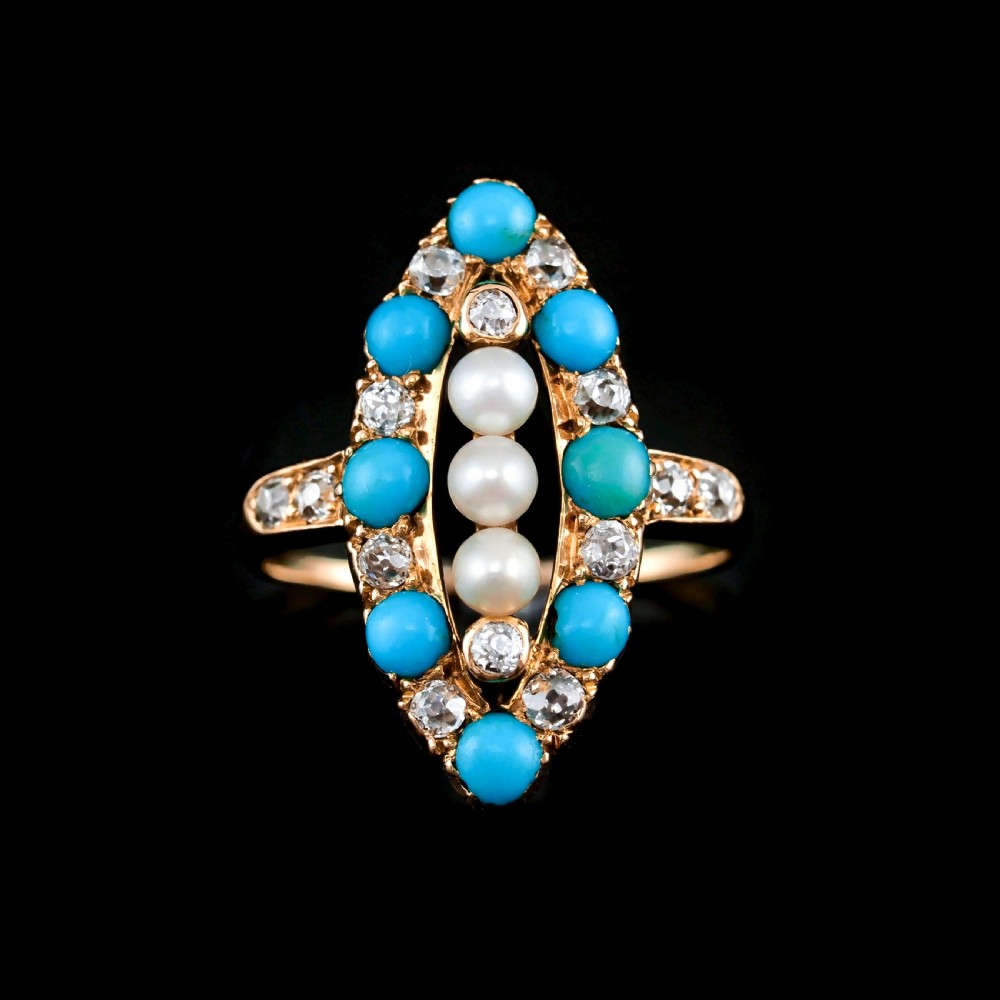 An antique Victorian 18ct yellow gold navette ring featuring three central pearls flanked by turquoise cabochons and old-cut diamonds. View II