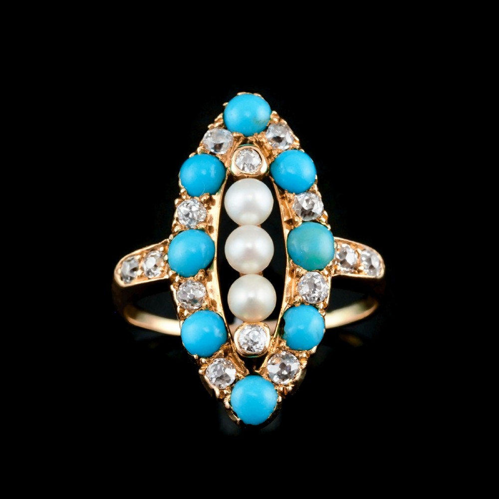 An antique Victorian 18ct yellow gold navette ring featuring three central pearls flanked by turquoise cabochons and old-cut diamonds. View III
