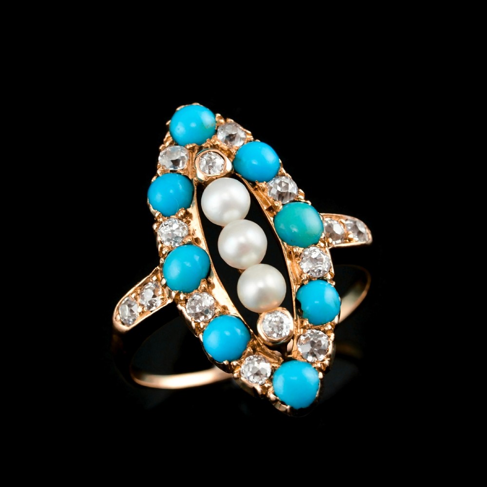 An antique Victorian 18ct yellow gold navette ring featuring three central pearls flanked by turquoise cabochons and old-cut diamonds. View VI