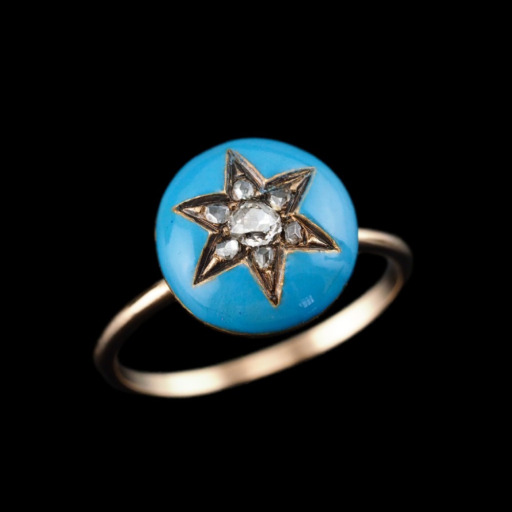 A 9ct yellow gold ring featuring a bright blue enamel dome set with a central six-pointed diamond star motif. View III