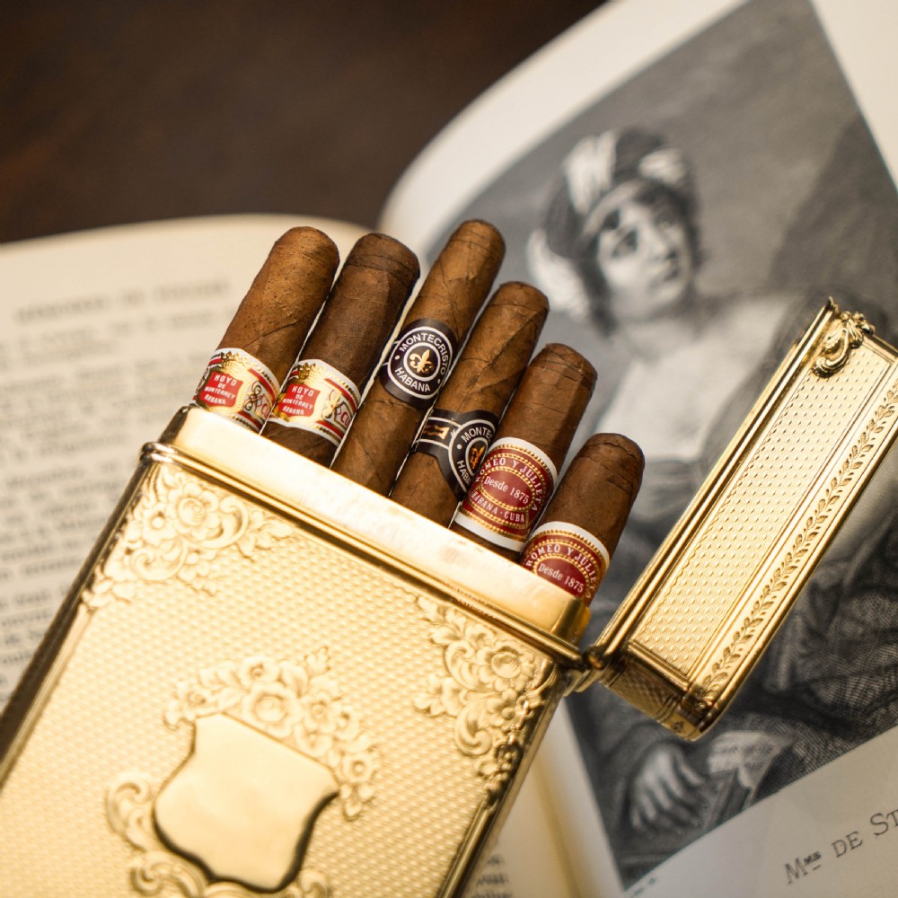 An antique Victorian sterling silver gilt cigar case featuring fine engine-turned texturing, scroll engraving, and a central unengraved cartouche. View VII
