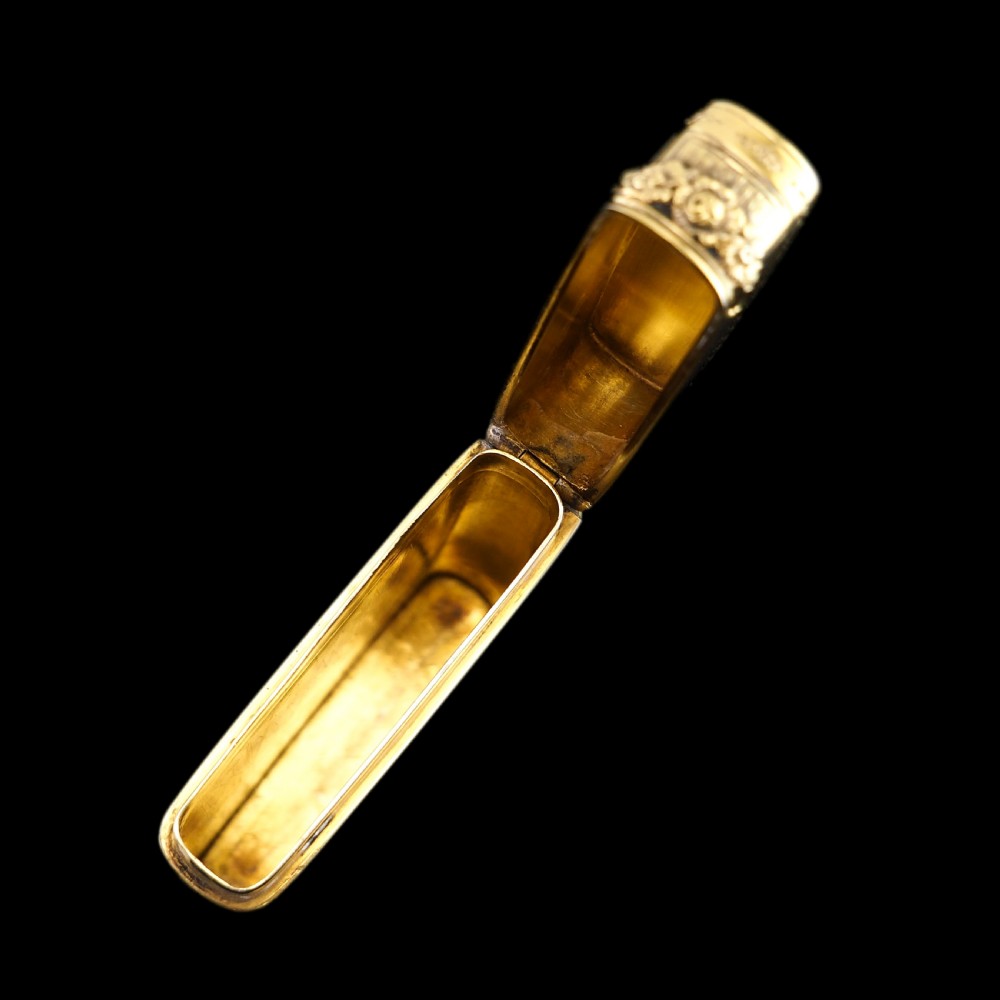 An antique Victorian sterling silver gilt cigar case featuring fine engine-turned texturing, scroll engraving, and a central unengraved cartouche. View XXIV