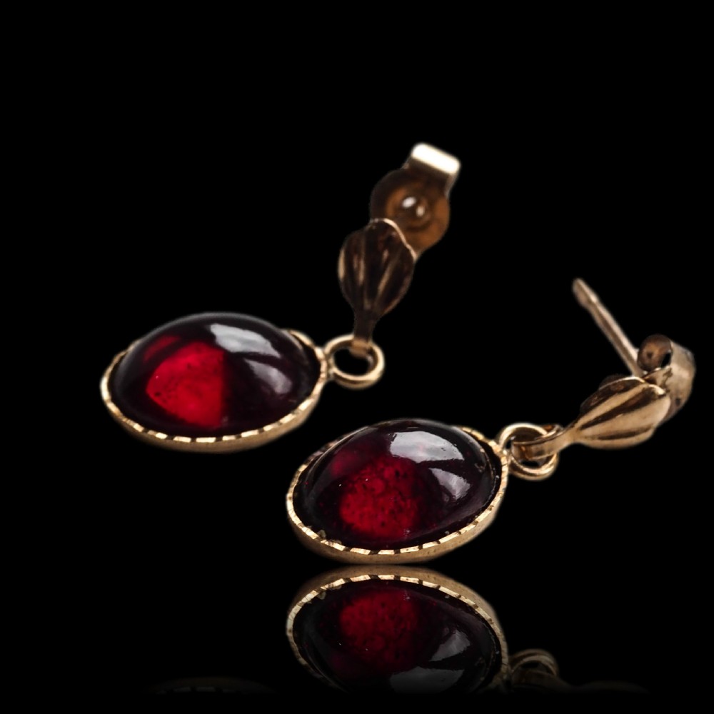 A Pair of Garnet Cabochon Earrings 9ct Gold View II