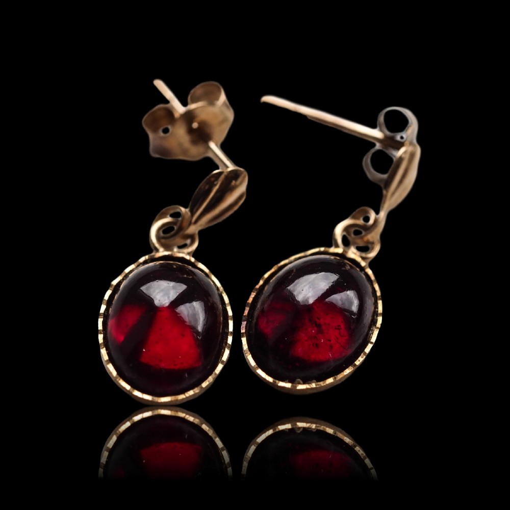 A Pair of Garnet Cabochon Earrings 9ct Gold View III