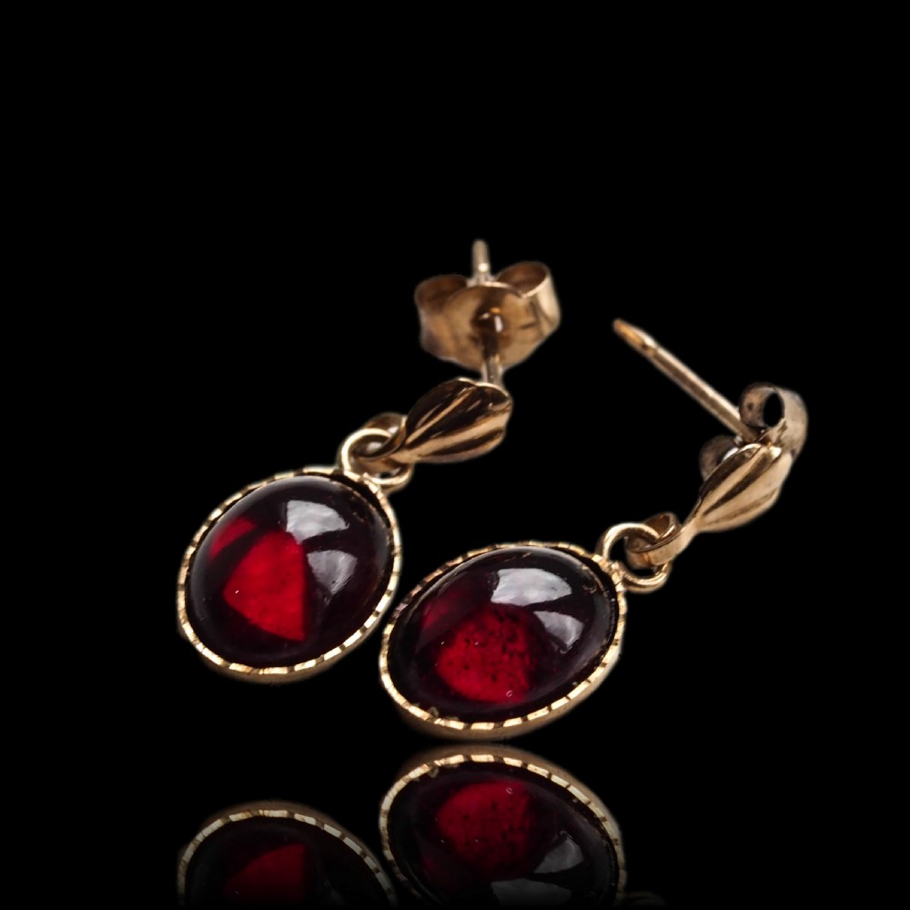 A Pair of Garnet Cabochon Earrings 9ct Gold View V