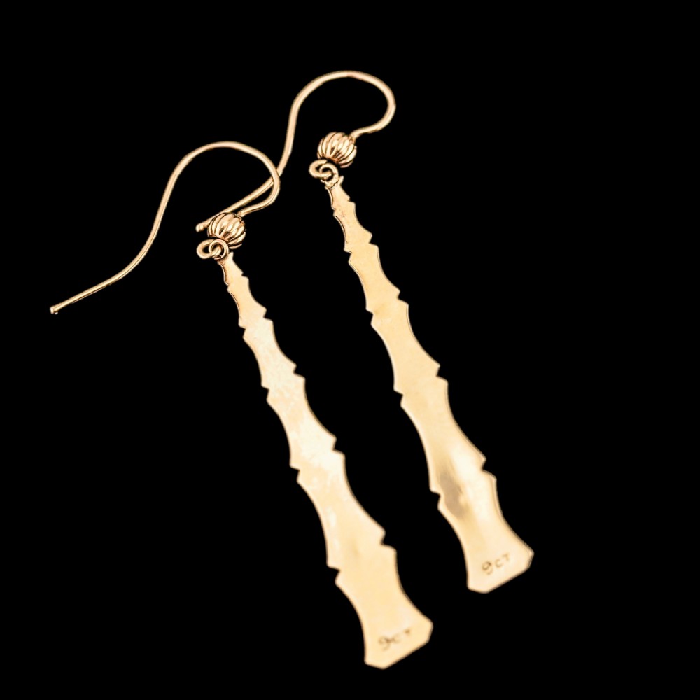 A pair of 9ct yellow gold drop earrings designed with stacked bamboo node motifs hanging from shepherd hook ear wires. View XIII