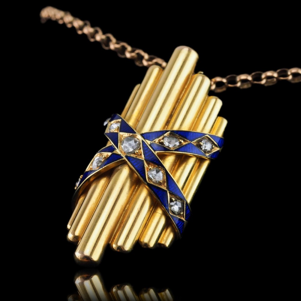 A Victorian 18K yellow gold pendant featuring vertical fluted bars encased by blue enamel cross-bands set with rose-cut diamonds. View XI