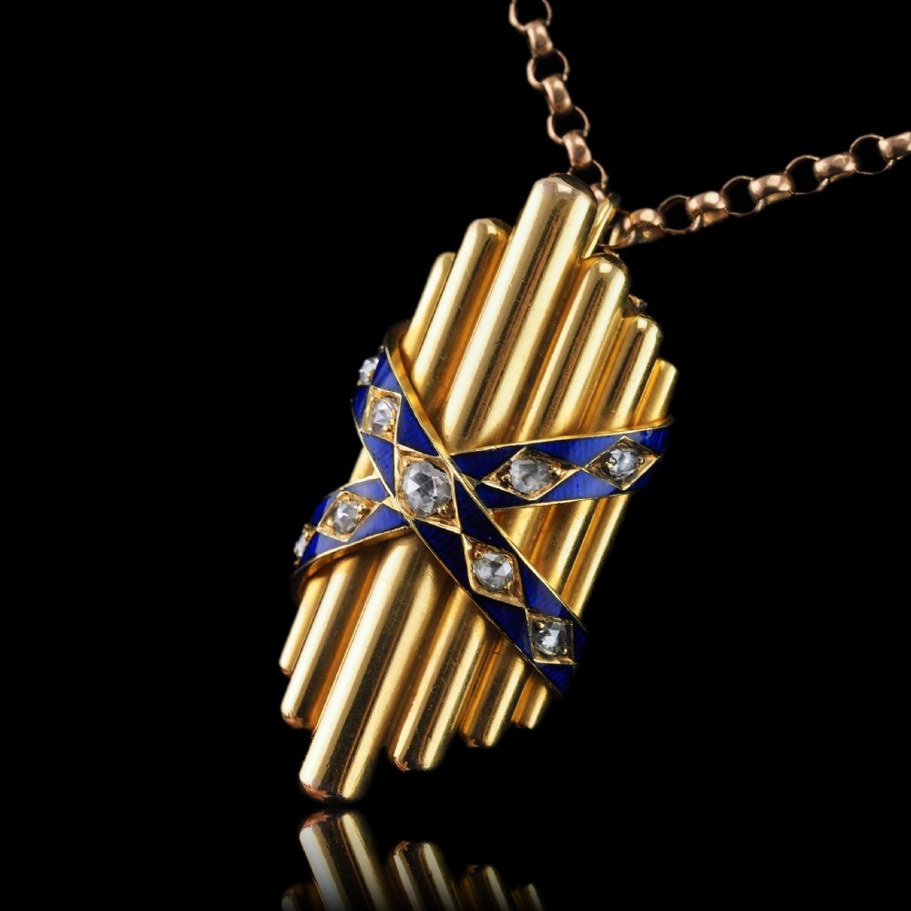 A Victorian 18K yellow gold pendant featuring vertical fluted bars encased by blue enamel cross-bands set with rose-cut diamonds. View XVI